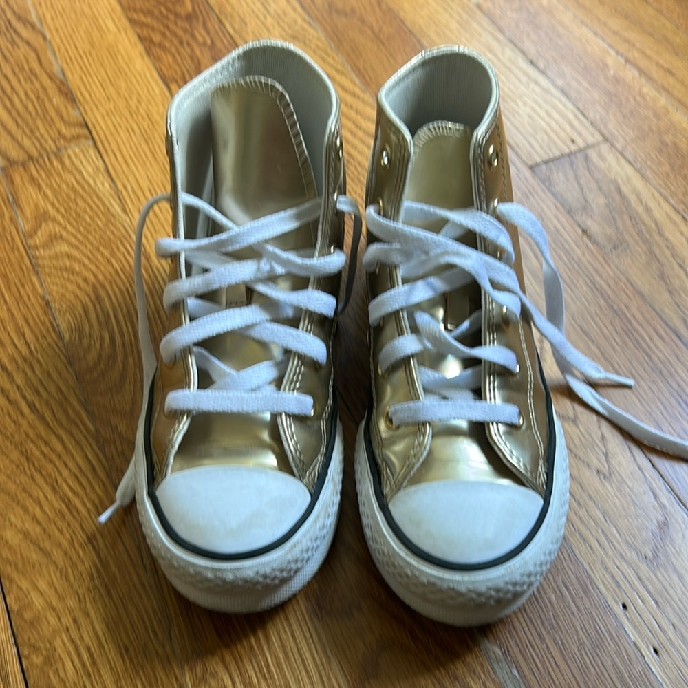 Gold converse high tops